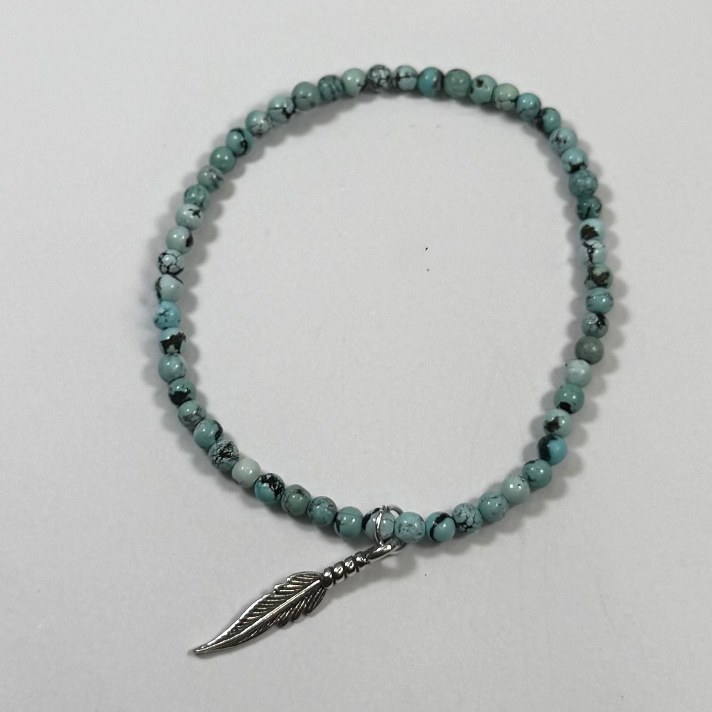 Mini Turquoise Bead Stretch Bracelet with Feather Charm