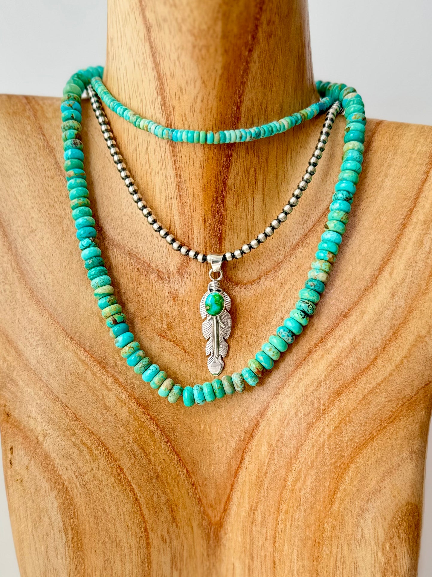 Sterling Silver Sonoran Gold Turquoise Feather Pendant -Artist- June Delgarito